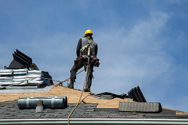 Professional Gutter Installation technician working in Lebam, WA